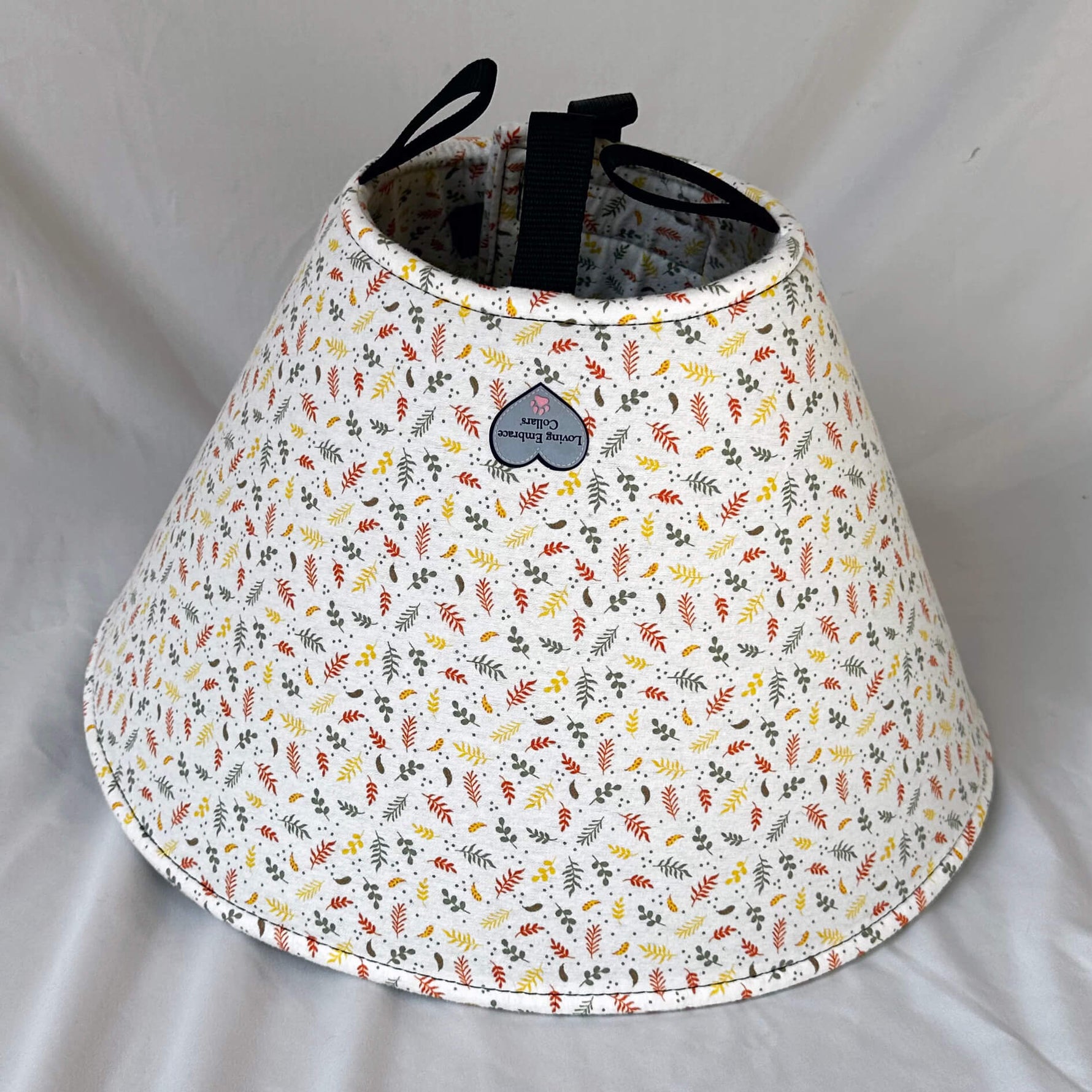 Soft Dog cone in leaf print flannel fabric.